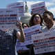 Activists rally at the U.S. Capitol April 10, 2019, against the transgender military service ban.